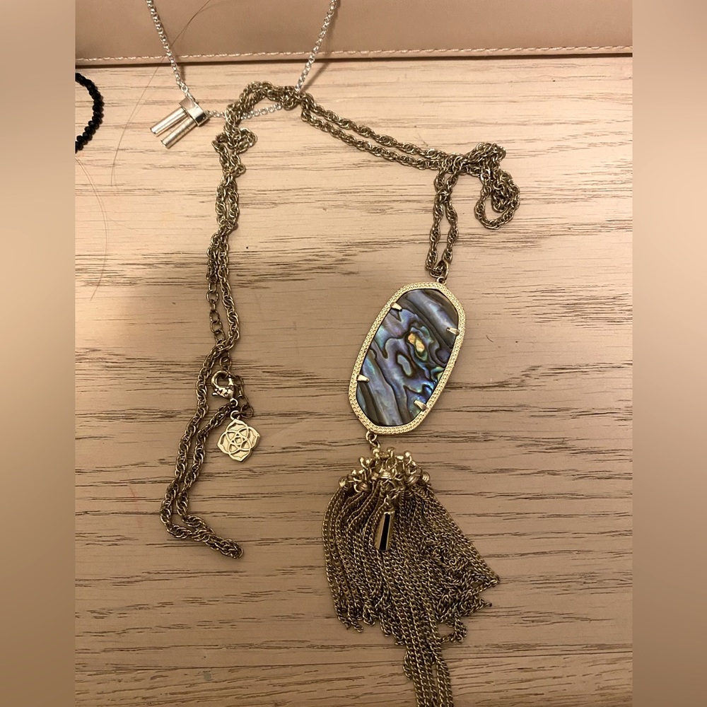 Kendra Scott tassel necklace with blue shell pendant